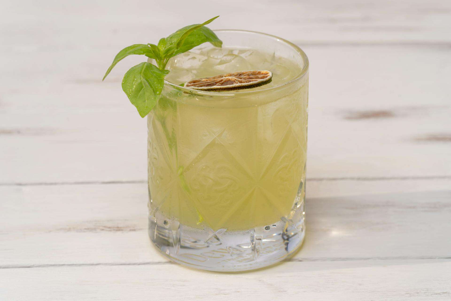 Virgin Basil Smash cocktail with basil garnish