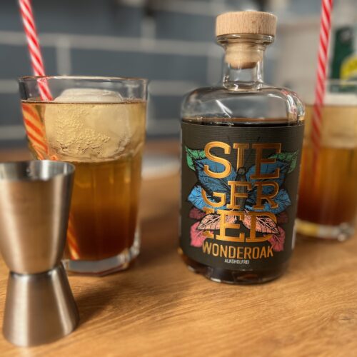 Non-alcoholic Dark n Stormy with a bottle of Wonderoak